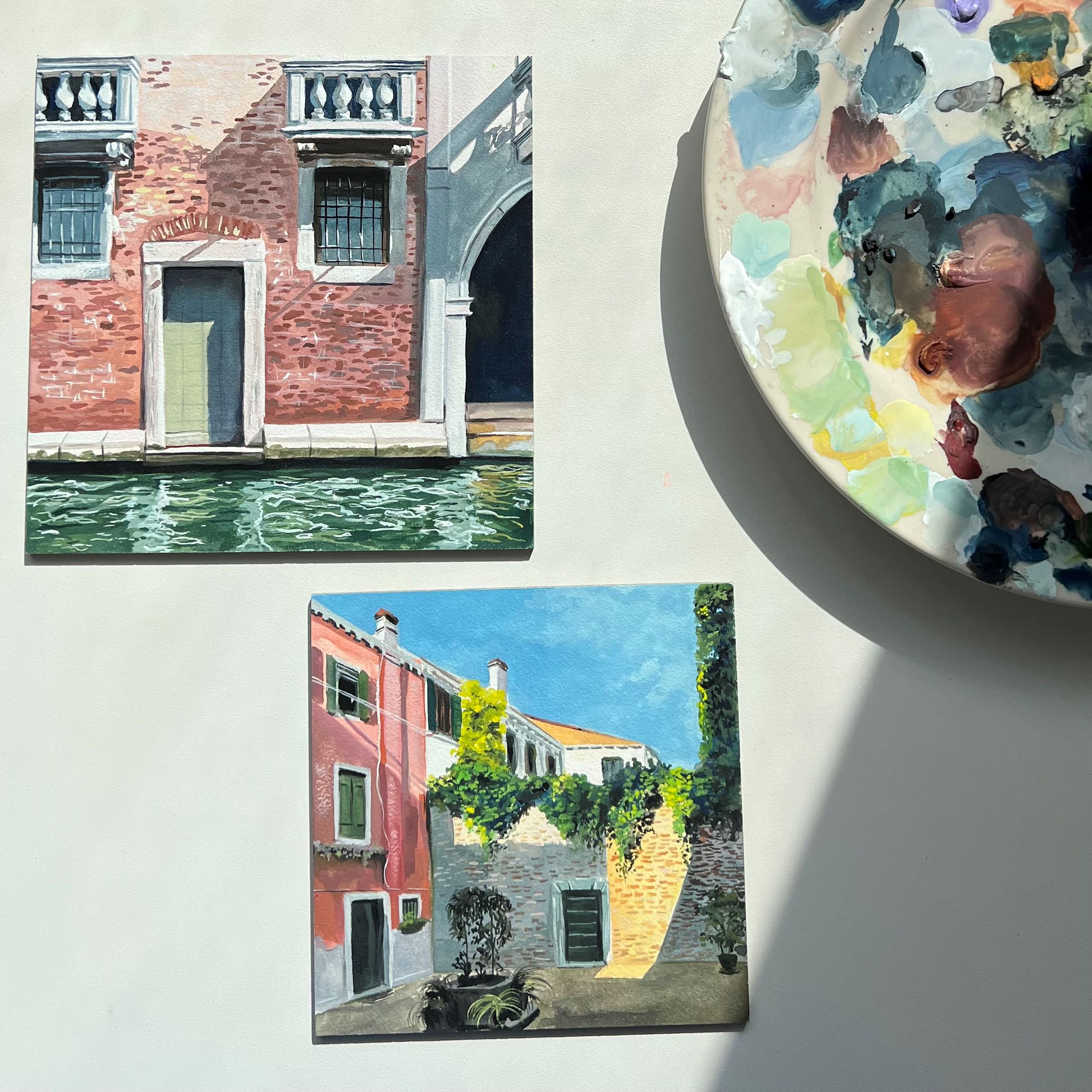 "Vibrant Venetian paintings and artist palette capturing iconic canal scenes."