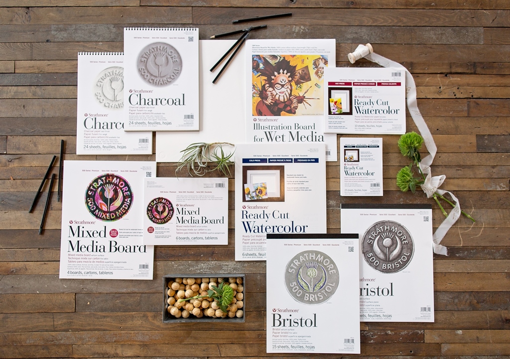 "Art supplies display: Strathmore charcoal, mixed media, watercolor, and Bristol boards."